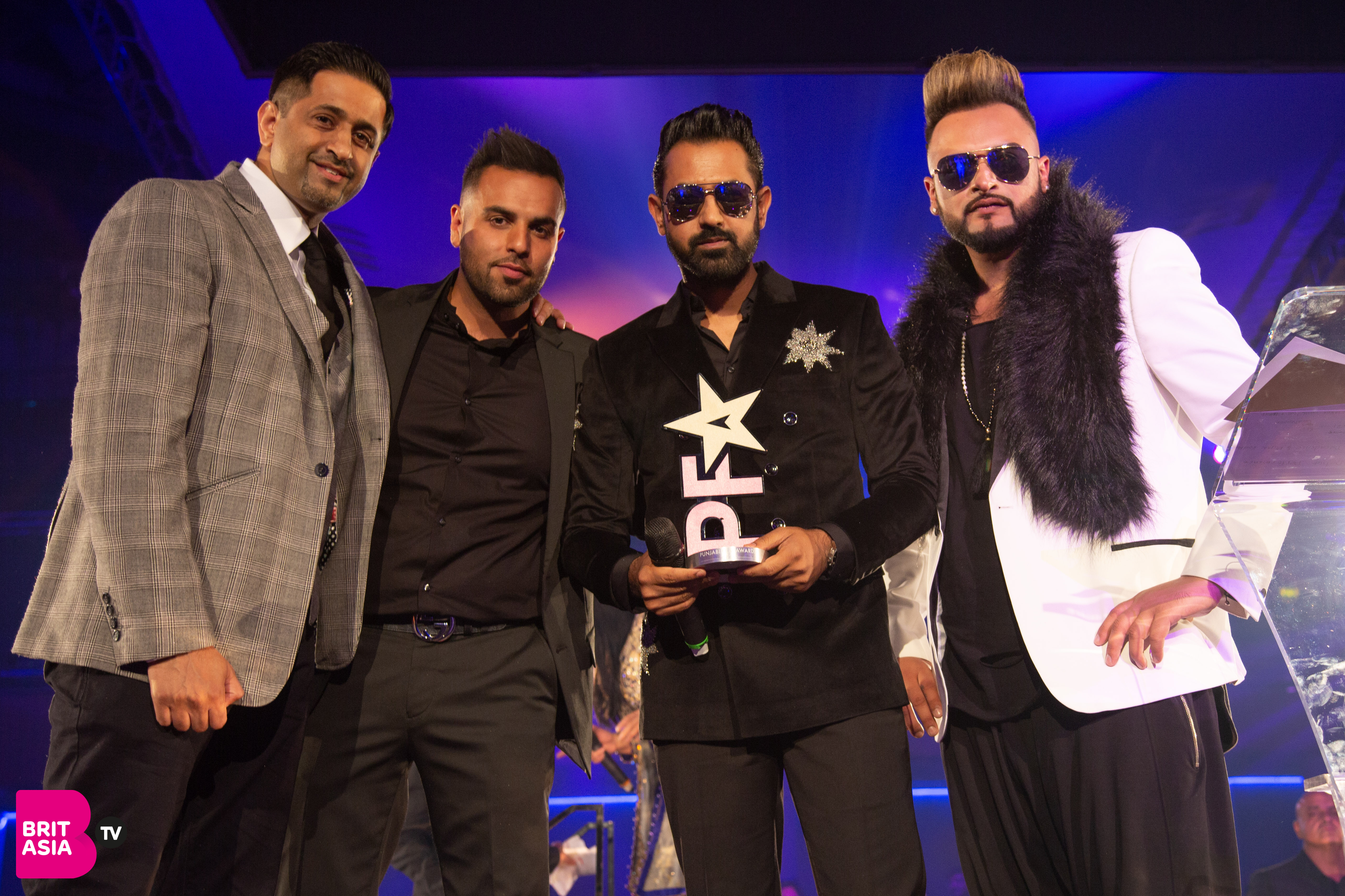 H Dhami, Gurj Sidhu and sponsor Snap Fitness 24/7 present the award for Best Film Song
