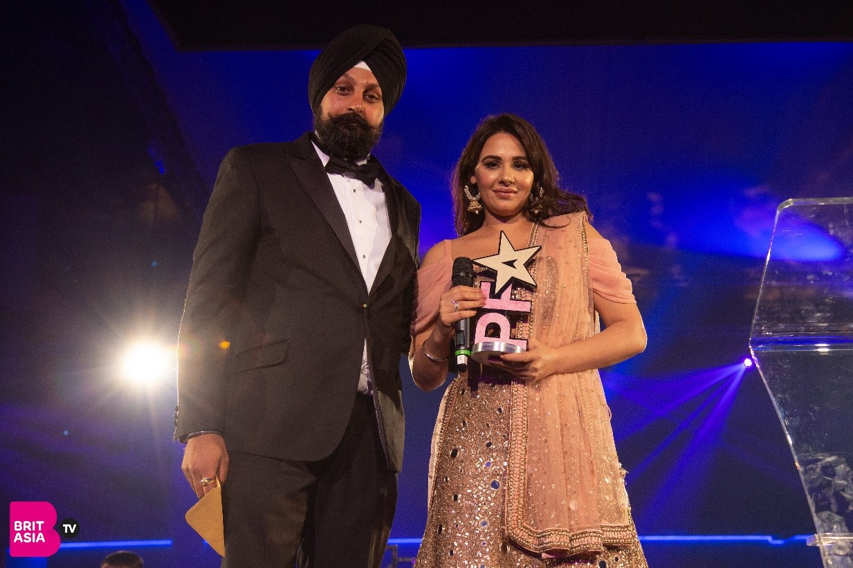 Mandy Takhar picks up the Inspiration Award presented by CEO of BritAsia TV, Tony Shergill