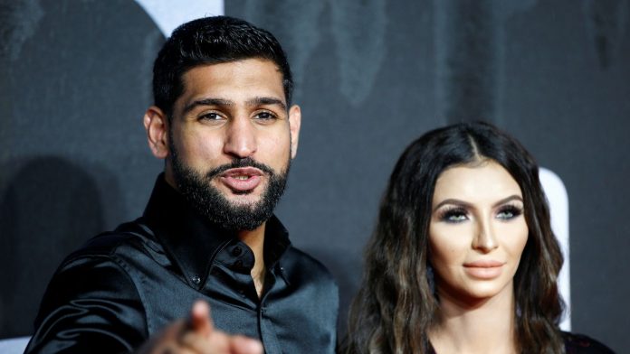 Three men arrested over gunpoint robbery of boxer Amir Khan