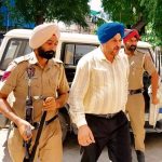 Police with sacked CIA official Pritpal Singh in Mansa