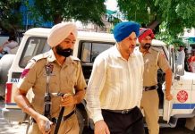 Police with sacked CIA official Pritpal Singh in Mansa