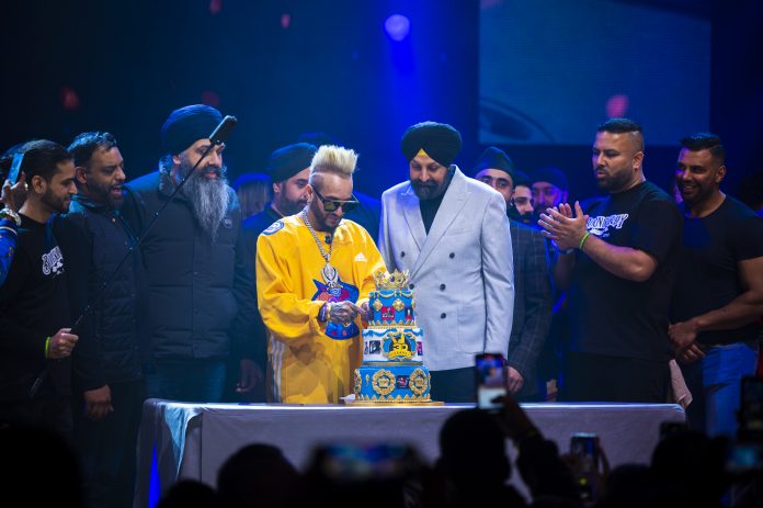 Jazzy B cuts a special cake presented by The Cake Shop