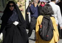 Iran's parliament has passed controversial bill that would increase prison terms and fines for women and girls who break its strict dress code.