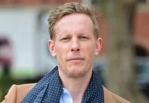 GB News has suspended host Laurence Fox after he denigrated a journalist and asked what "self-respecting man" would "climb into bed" with her.