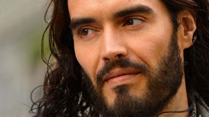 YouTube has suspended adverts on videos by Russell Brand after the comedian was accused of rape and sexual assault.